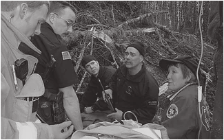 Emergency responders coordinating a rescue operation in the field